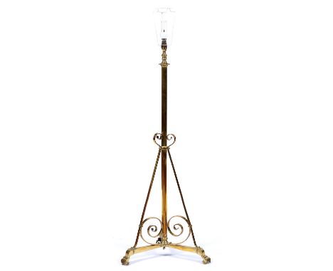 An Edwardian telescopic brass oil lamp standard, converted to electricity, lacks fitment, telescopic action inoperative, 115c