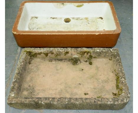 A shallow sandstone rectangular sink with rounded front right corner, 95 x 58cm, 13cm deep and a Victorian cream and saltglaz