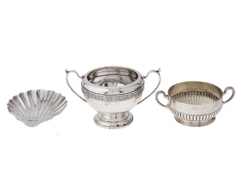 A George V silver sugar bowl, 90mm h, by C &amp; R Comyns, London 1924, another of porringer form by Edward Barnard &amp; Son