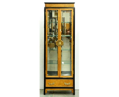 A Chinese style light wood and ebonised display cabinet, late 20th c, with brass handles, plate glass shelves and internal li