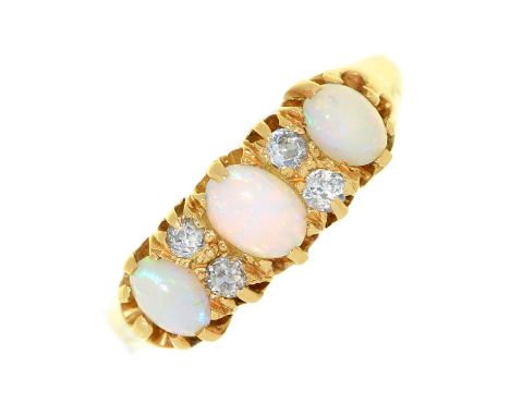 An opal and diamond ring, in gold, marks rubbed, 3.4g, size I Some wear to the polish of the opals