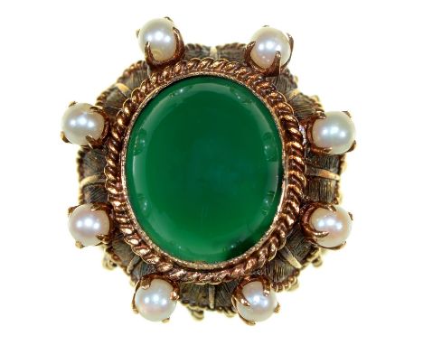 A chrysoprase ring, the oval cabochon with cultured pearl surround, in gold, indistinct foreign control mark, 15.2g, size M G