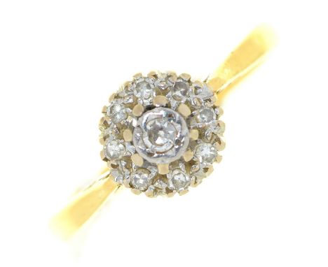 A diamond cluster ring, in 18ct gold, London 1962, 2.9g, size O Good condition, wear consistent with age