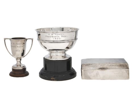 An Edwardian silver rose bowl,&nbsp; 90mm h, by Skinner &amp; Co, London 1907 and a silver cigarette box and trophy cup, 8ozs