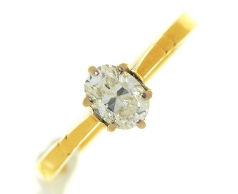 A diamond solitaire ring, in 18ct gold, marks obscured, hoop inscribed 0.50, 2.5g, size L Light wear