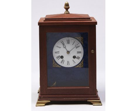 A mahogany mantle clock, with earlier French bell striking movement, enamel dial and Breguet hands, 30cm h Good condition. No