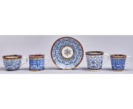 Two Flight Worcester Royal Lily pattern bucket shaped cups and a saucer, c1790, saucer 14cm diam, crescent or unmarked and a 