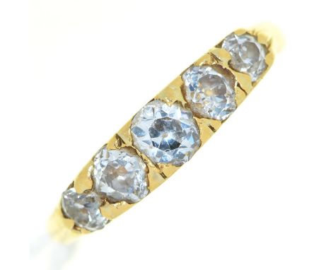 A five stone diamond ring, with cushion shaped old cut diamonds, in gold marked 18ct, 3.4g, size O Wear consistent with age