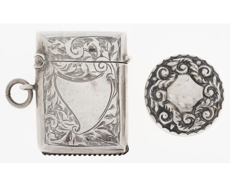 A George V silver vesta case, 35mm h, by W H Haseler Ltd, Birmingham 1912 and a Victorian silver salve or ointment pot and co