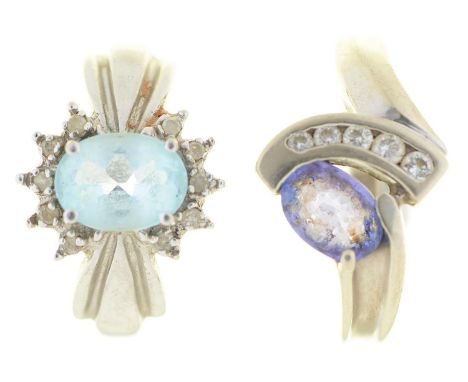 Two white gold rings, variously gem set, one marked 10K, the other 14K, 2.2 and 3.6g respectively, sizes I and J Light wear
