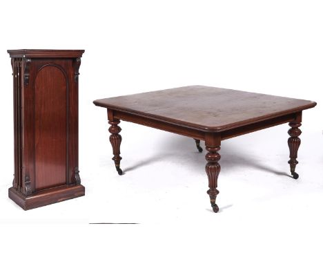 A Victorian mahogany extending dining table, c1860, the rectangular top with rounded corners above fluted turned tapered legs