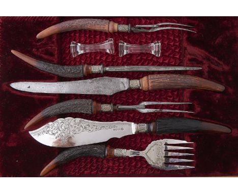 A Victorian antler hafted EPNS carving set, c1900, in plush lined walnut case Good condition. One item deficient but with pai