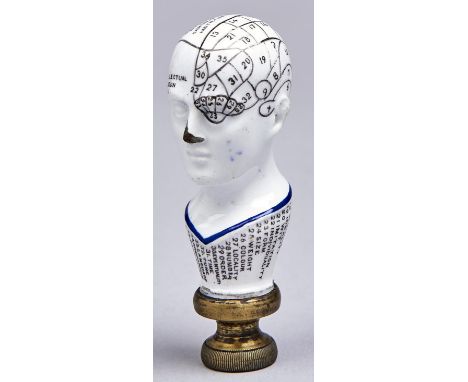 Phrenology. An English earthenware phrenological head seal, c1860, transfer printed and mapped in black, the truncation outli
