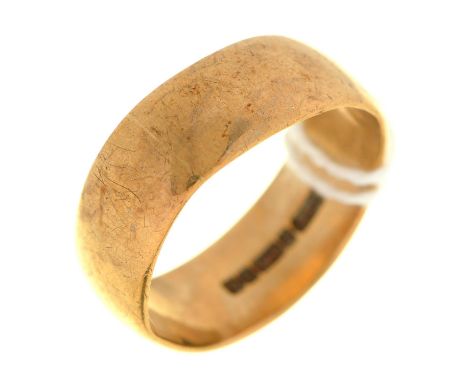 A 9ct gold wedding ring, Birmingham 1966, 7.6g, size S Worn and distorted