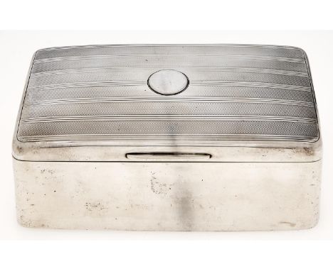 A George V silver cigarette box,&nbsp; cedar lined, 17.5cm l, by Mappin &amp; Webb, Birmingham 1920 Dented and worn, applied 