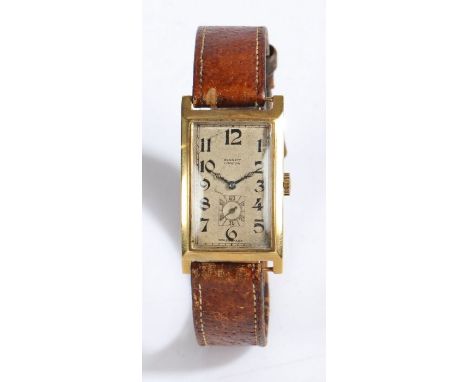 Bennett London 18 carat gentleman's wristwatch, circa 1920, the signed dial with Arabic numerals, outer minutes track and sub