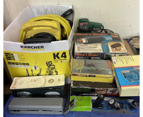 A Karcher jet wash together with a collection of tools