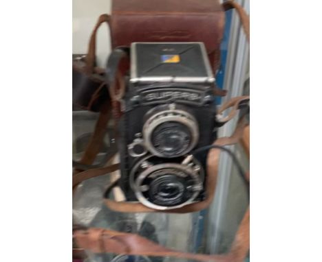 A Voightlander Superb camera, in a leather case