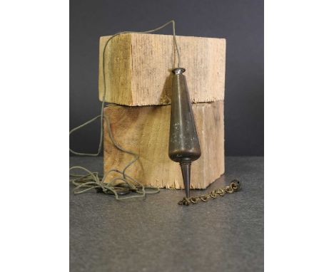 Of architectural interest: a cast brass Victorian plumb line, 19th century, owned and likely used by John Wolfe Barry in the 