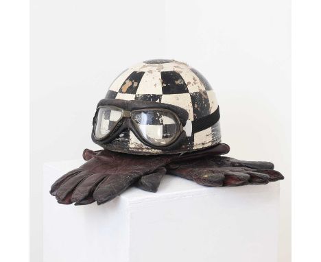 A crash helmet,1930s and later, a pudding-basin-style motorcycle helmet by Cromwell, decorated in a black and white chequered