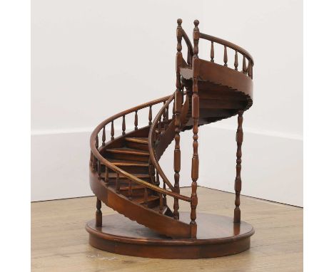 A large fruitwood architectural model of a spiral staircase,c.1880, French, with sixteen steps, with individually hand-turned
