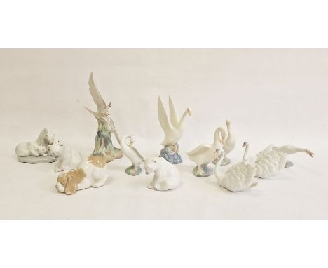 Lladro polar bear family group, two other Lladro model polar bears, two Lladro swans, two Lladro goose models and five Nao an