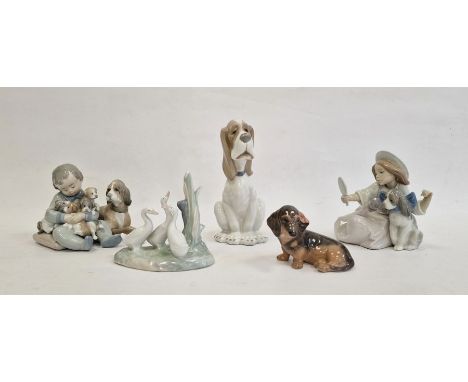 Copenhagen model dachshunds, 3140, Lladro figure group,&nbsp;boy with dog and puppies another, girl with mirror and puppies, 