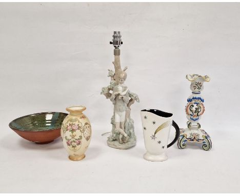 Lladro porcelain lampstand in the form of a boy feeding dove from his hand, 35cm high, Quimper style pottery candlestick, Wad