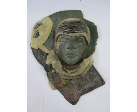 Joanna Drummond ceramic wall decoration depicting the head of 'Dyaus' (the Hindu God of the sky) , annotated and signed to re