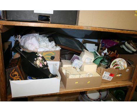 A shelf of miscellaneous including wristwatches, dolls etc.