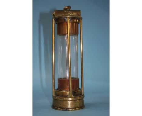 An early Usworth Washington brass, four bar miners lamp, maker T. Crake.  23cm height