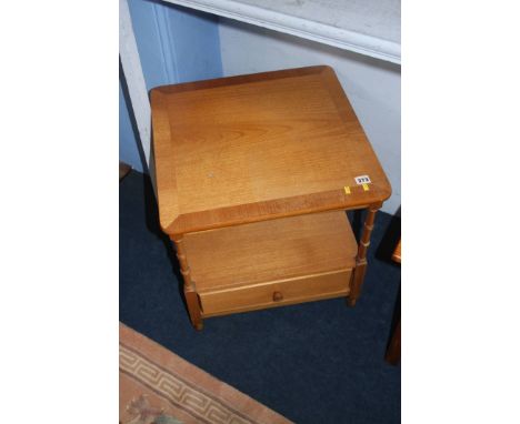An oak single drawer lamp table