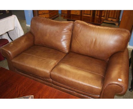 A harvest brown leather two seater Laura Ashley sofa