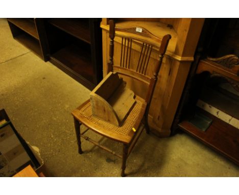 A cane seated bedroom chair; and a pine corner shelf 