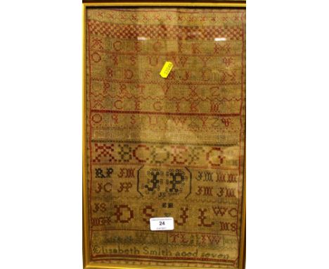 A 19th Century needlework sampler named to Elizabeth Smith aged 7
