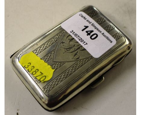 A small silver cigarette case 