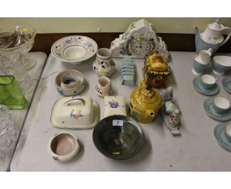 A Portmeirion china mantel clock; together with a quantity of various Poole pottery; a cottage ware teapot; a Studio pottery 