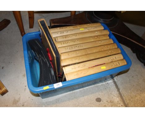 A box of wooden post-card albums and contents 
