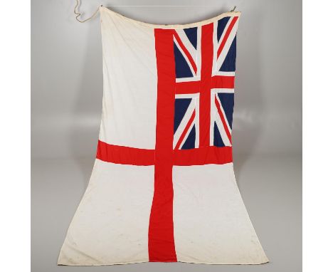 A White Ensign 6' x 12' (183cm x 366cm) Marked indistinctly to the border with a Government arrow, ' 57 3792… White Ensign'. 