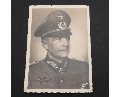 A signed photographic postcard of Walter Von Brauchitsch (1881-1948), head and shoulders portrait in uniform with signature b