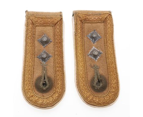 A pair of Afrikakorps Infantry shoulder straps, pale khaki coloured with white piping for the infantry, pale brown braid and 