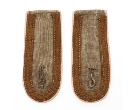 A pair of Afrikakorps Infantry shoulder straps, pale khaki coloured with white piping for the infantry, pale brown braid for 