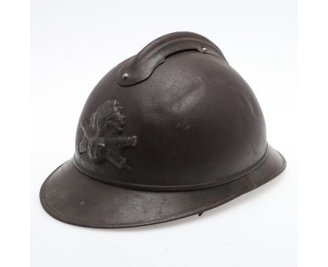 A Great War period French Artillery M15 pattern steel 'Adrian' Helmet with applied 'comb' with split-pin fixings and Artiller