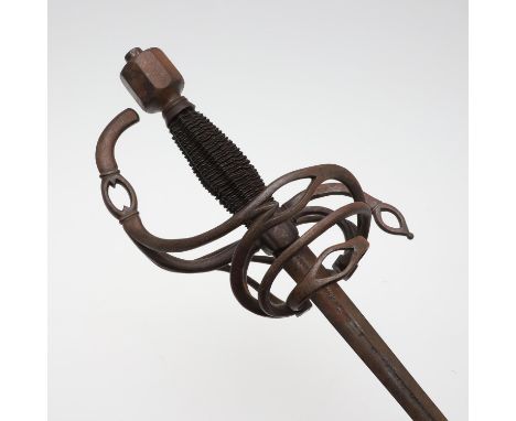 With a 89cm tapering blade with rounded point, The wire bound grip within an elaborate scrolling guard and straight sided oct