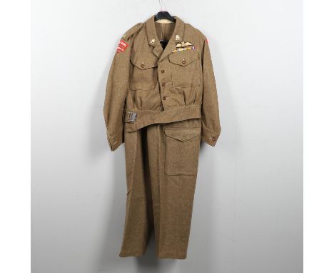 An interesting Glamourgan Battledress, the blouse dated July, 1945 'Battledress Blouse Serge, Size 9, with Government issue a