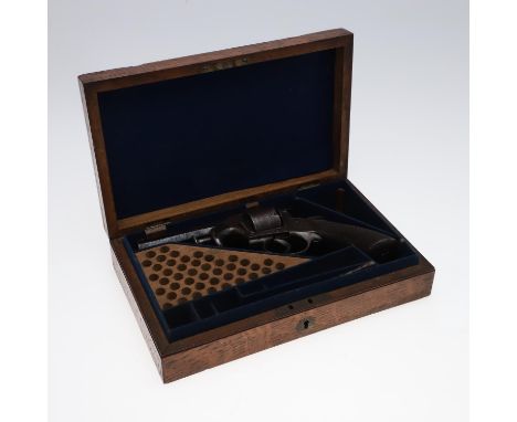 With a 9.5cm octagonal barrel with scrolling foliate engraving, with a five shot revolving barrel, double action and side-mou