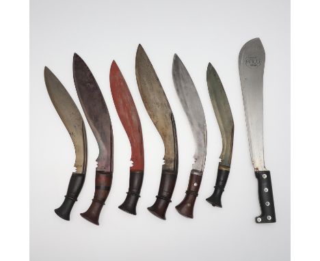 A Military issue Kukri knife with traditionally shaped 34cm blade with sharpened edge, indistinctly marked for A. Singh and S