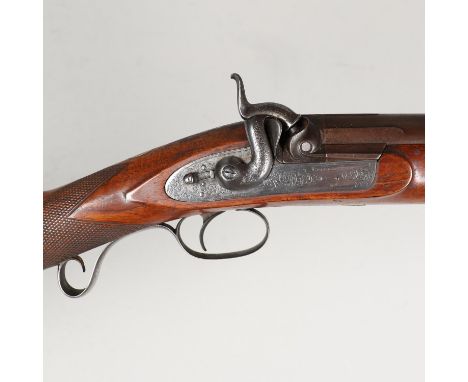 With an 88cm Damascus barrel, with heavy duty ebonised ram rod below, muzzle loading with a percussion firing action with sli