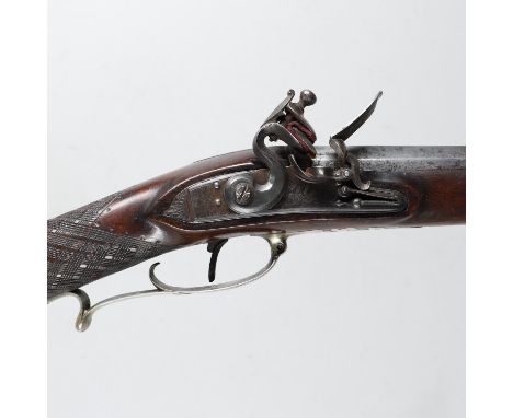 With a heavy 70.5cm octagonal barrel with folding rear sight, and ramrod mounted below the barrel. With Flintlock action with