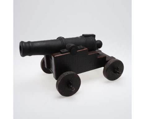 A signal cannon with a 48cm iron barrel inset with a rectangular lead cartouche 'K M 1799' The barrel with a bore of 38mm. On
